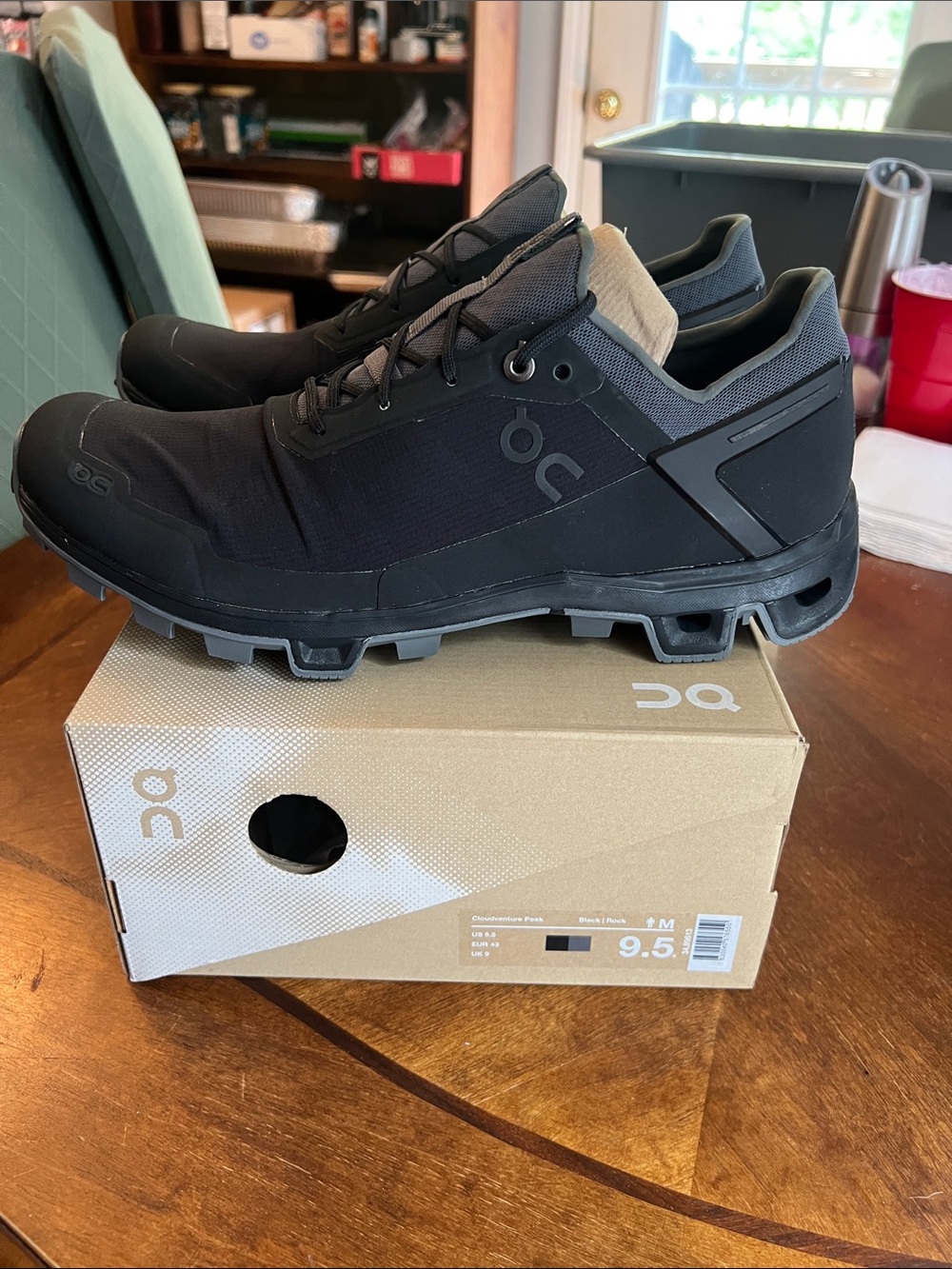 On Cloud Running Men's Cloudventure Peak Trail Shoes in Black and Gray